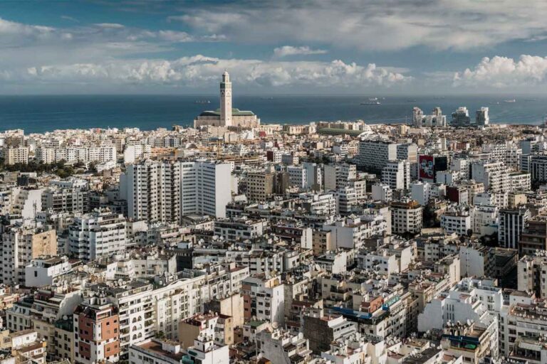 Casablanca skyline with the minaret of the Hassan II Mosque by the Atlantic