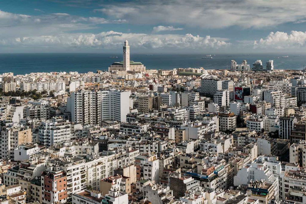 Casablanca skyline with the minaret of the Hassan II Mosque by the Atlantic